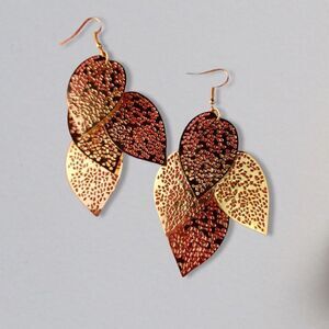 Cascading gold tone fashion earrings fillagree